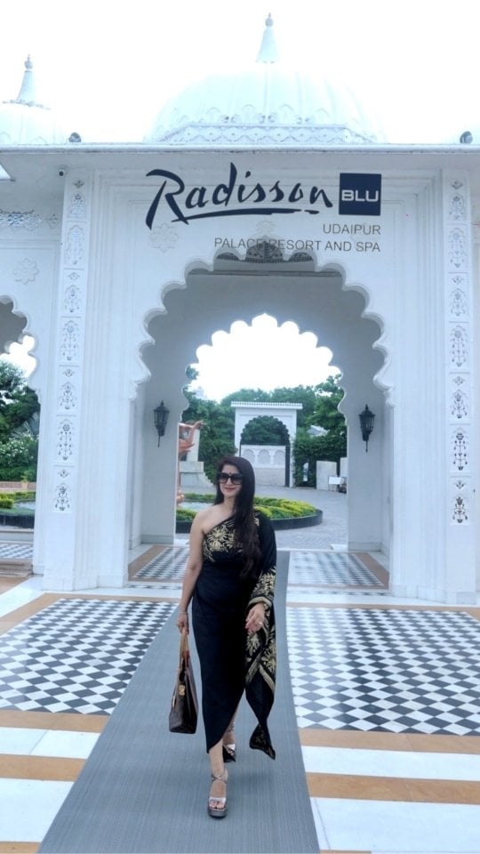 A Royal Dream Come True in Udaipur ✨Staying at the Radisson Blu Palace Resort felt like stepping into a regal fairytale. Nestled by the serene Fateh Sagar Lake, the views were absolutely mesmerizing — especially during rooftop candlelit dinners and magical musical nights under the stars. 🎶🌌Every corner of the palace is crafted with elegance — intricate arches, royal corridors, and décor that transports you into a regal world. The hospitality? Absolutely top-tier. The staff treats you like royalty from check-in to farewell. 👑The Presidential Suite was the crown jewel — with its a private fountain, , in-room bar, elegant interiors, and thoughtful design, it became the soul of our royal escape. ✨💫The evenings came alive with folk music, puppet shows, and cultural performances, giving us a taste of Rajasthan’s rich heritage right inside the palace walls. 🎭🪷From the warm staff to the luxurious vibe, regal architecture, and palace vibes in every corner — this wasn’t just a stay, it was an an experience we’ll never forget.💙... #RoyalStay #UdaipurDiaries #Regalvibes #RadissonBluUdaipur #PalaceVibes #FatehSagarViews #LuxuryTravelIndia #luxuryhotel #fyp #explorepage #LuxuryRetreat #India #palaceHotel by @nupur.sakhuja7