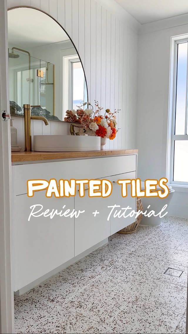 How we did it ⤵️1. To start with we removed any silicone from the edges of the tiles, gave them a good scrub with sugar soap & a scourer then tapped up edges.2. We then used Dulux Renovation Range Primer & applied as per their instructions. 3. After waiting the recommend time, we then done our first coat of base coat using Dulux Renovation Range for Floors. You can have whatever color you like mixed up. We used Limed White Quarter. Ensure a nice even coat, following recommended application instructions.4. Wait the recommend 8 hours between coats. We then applied our second coat in stages, tile by tile and as we did each tile we used the Rustoleum Rocksolid Decorative chips & sprinkled them evenly by hand over the tile. We continued this till all tiles were covered and left to dry again for another 8 hours. 5. We then used Dulux reno range Satin Clear Coat & mixed in a clear slip resistant additive. (It’s important to note that the clear top coat is NOT recommended for floor tiles as it makes them slippery) we then went through an applied this to the flooring, sprinkling more terrazzo chips in any areas that we felt were not quite even. Once complete we left to set again for another 8 hours. 6. We then completed another coat of the clear Coat with Slip resistant additive mixed in. (Berger jet dry)& when finished sprinkled an extremly light coat of the addictive on top of wet tiles. 7. Then wait! Do not walk on or touch for a minimum of 72 hours! Extremely light use after 72hours for 7 days. This is important to ensure it sets hard! We did not use this bathroom for a whole week following & only touched to see if dry after the initial 3 days. Ta-da!!! 💫DISCLAIMER: THIS POST IS NOT SPONSORED BY DULUX. THE PROCESS WE FOLLOWED HAS NOT BEEN TESTED BY DULUX THEREFORE IS NOT RECOMMENDED AS RESULTS ARE NOT GUARANTEED. If you choose to try this method please do so at your own risk.While this has lasted 4 years for us, RESULTS MAY VARY. by @brookeposted