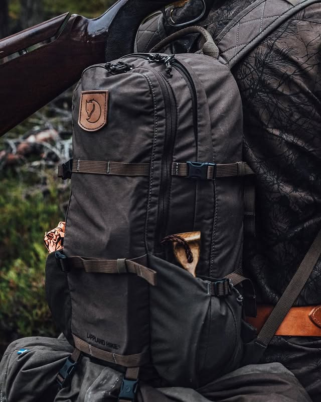 Meet the Fjällräven Lappland Hike 15 Backpack. Its slim profile has an excellent fit that reduces the risk of the pack fastening on branches and undergrowth. The innovative back plate is made from pressed discarded wool and is an excellent temperature regulator; keeping you well-ventilated in warm weather. #conscioushunting by @fjallravenhunting