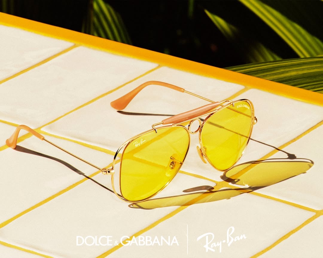 Dolce&Gabbana reimagines the Shooter, pairing signature detailing with colorful lenses and a futuristic edge. The archival mother-of-pearl brow bar meet colorful lenses with an innovative cut. by @rayban