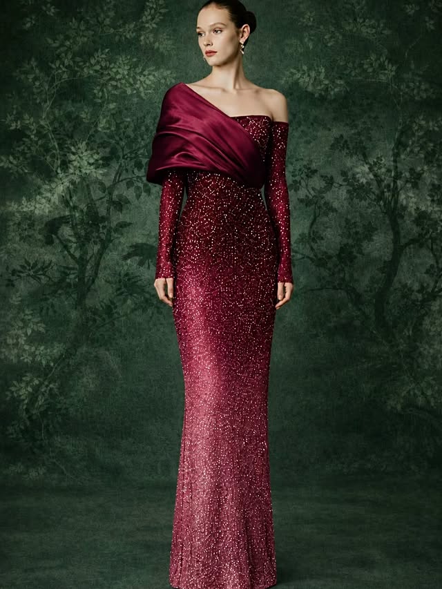 Like stardust scattered across a midnight garden, this sculpted silhouette captures the enchanting spirit of Botánica Oscura. #BurgundyElegance #CrystalCouture #EveningGown #LuxuryFashion #ModernCouture by @anayacollection
