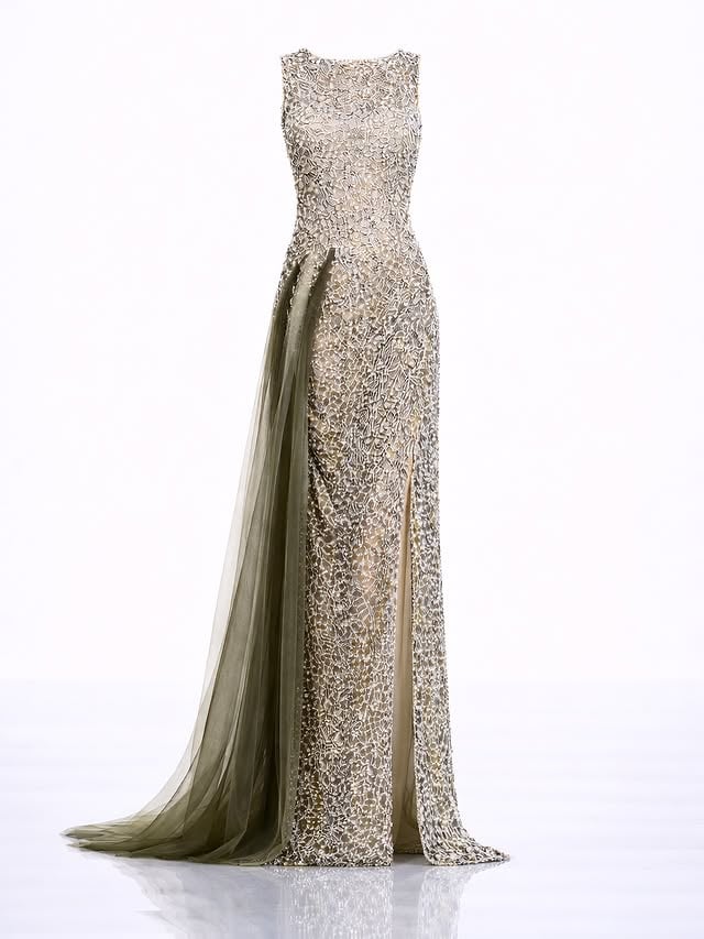 “The Anaya Luminary Gown” - Like sea foam weaving through rocky shores, this gown shimmers with intricate lacework that mimics coral textures, while a billowing tulle train unfurls like drifting posidonia ( sea grass) in motion. A fusion of strength and fragility, it captures the raw poetry of the Balearic coastline - where land and ocean eternally entwine.🤍#pfw #couture #gown #anayacollection #runway dubai couture pfw dfw fashion fashionweek parisfashionweek eveningwear luxury ʀᴇᴀᴅʏᴛᴏᴡᴇᴀʀ by @anayacollection