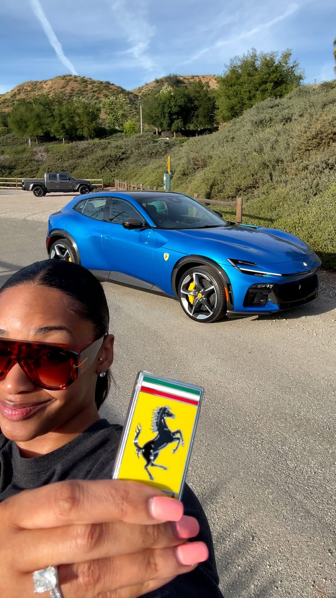 Ferrari said KNOCK, KNOCK….SPECIAL DELIVERY! This is the Ferrari Purosangue and Bougie Jazz has officially entered the chat 😂 This thing is NASTY! You think it’s worth $500k? 👀👀👀 Grab your @barrettsautomotive today and keep your car clean all summer! 
🎥: @faridvisual